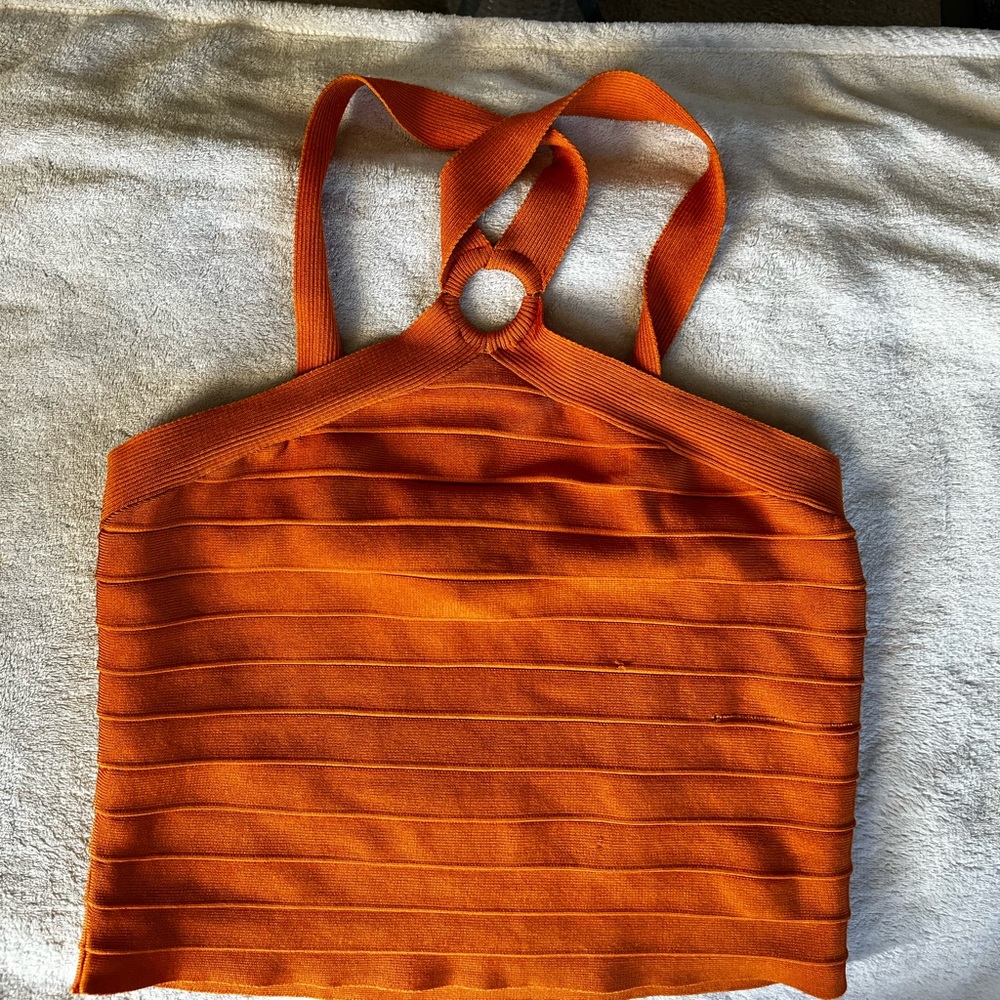 Stretchy orange criss-cross halter top